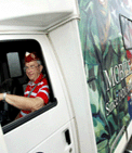 D A V Member Driving a D A V Van - Image
